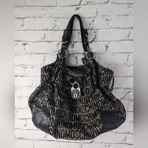 Moschino Monogram shoulder bag, slouchy fabric and leather handbag,